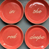 Slipware Word Plates, ‘In the Red Deeps’
