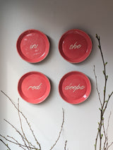 Slipware Word Plates, ‘In the Red Deeps’