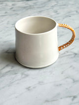 Twig Handled Porcelain Mugs and Jugs with Lichen Orange Glaze