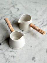 Twig Handled Porcelain Mugs and Jugs with Lichen Orange Glaze