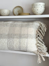 The Merchants Table patchwork handwoven wool cushion by Hollie Ward