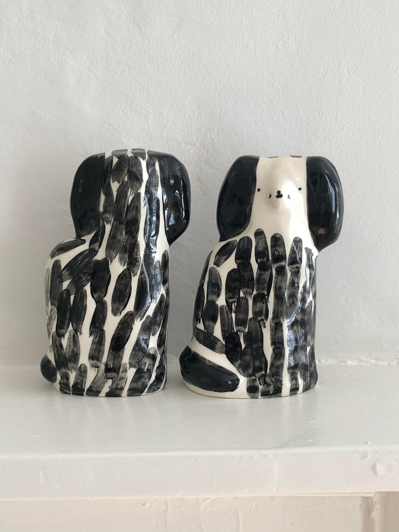 A Pair of Black Spotted Staffordshire Dogs