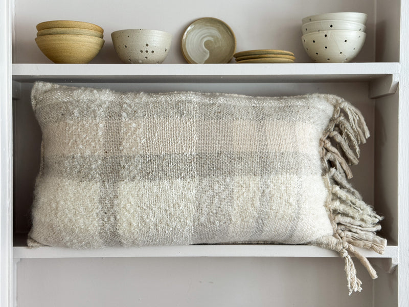 The Merchants Table patchwork handwoven wool cushion by Hollie Ward