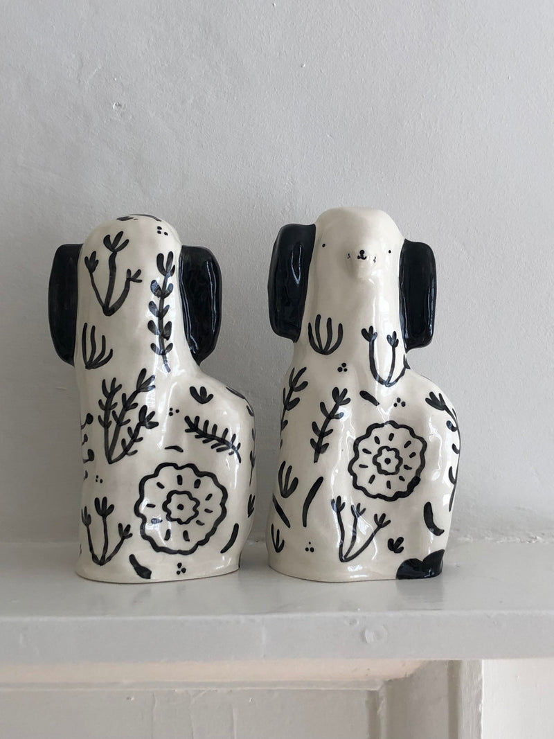 A Pair of Black Floral Staffordshire Dogs - Alex Sickling